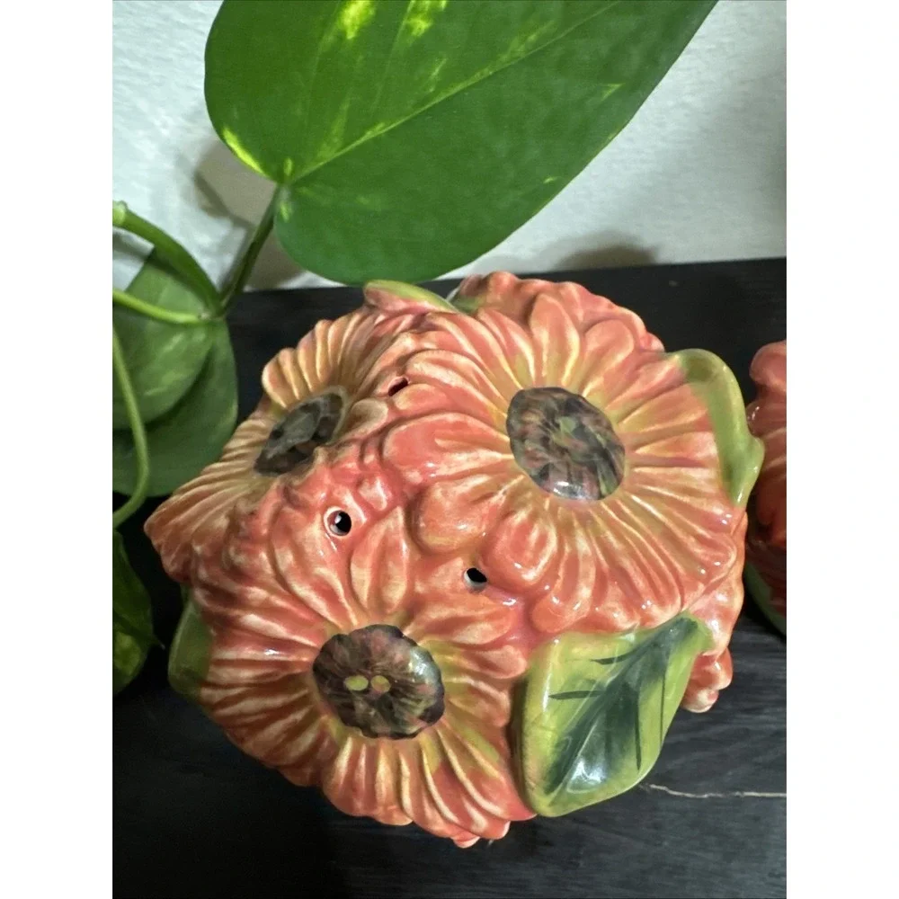 A bouquet of Flower -  Salt And Pepper Shakers. One Tiny‎ Chip On One Of Them.